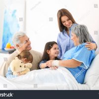 stock-photo-family-visiting-grandmother-in-hospital-588742967